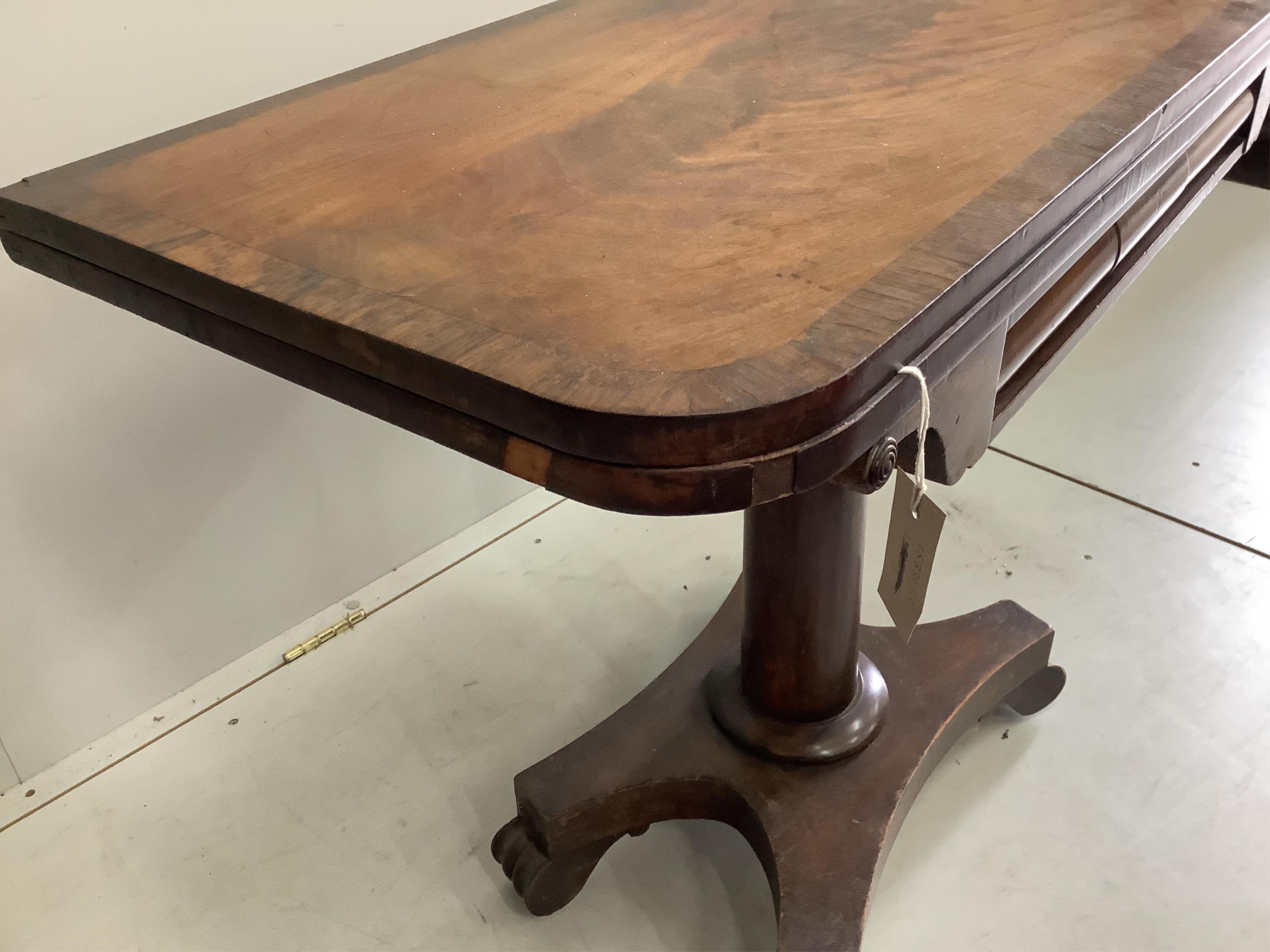 An early Victorian rosewood banded mahogany folding card table, width 90cm, depth 45cm, height 73cm. Condition - fair